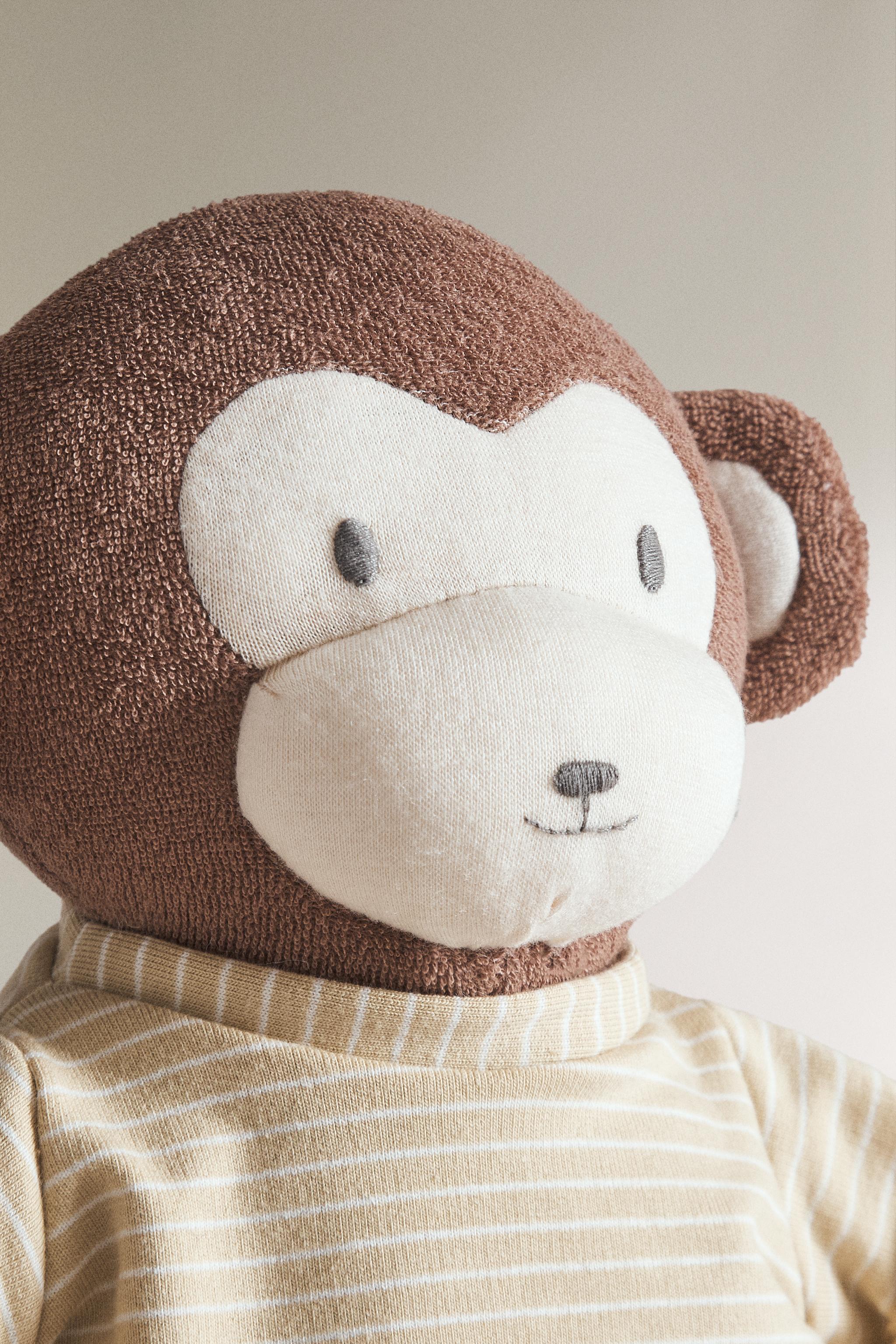 PELUCHE ENFANT SINGE MUSICAL